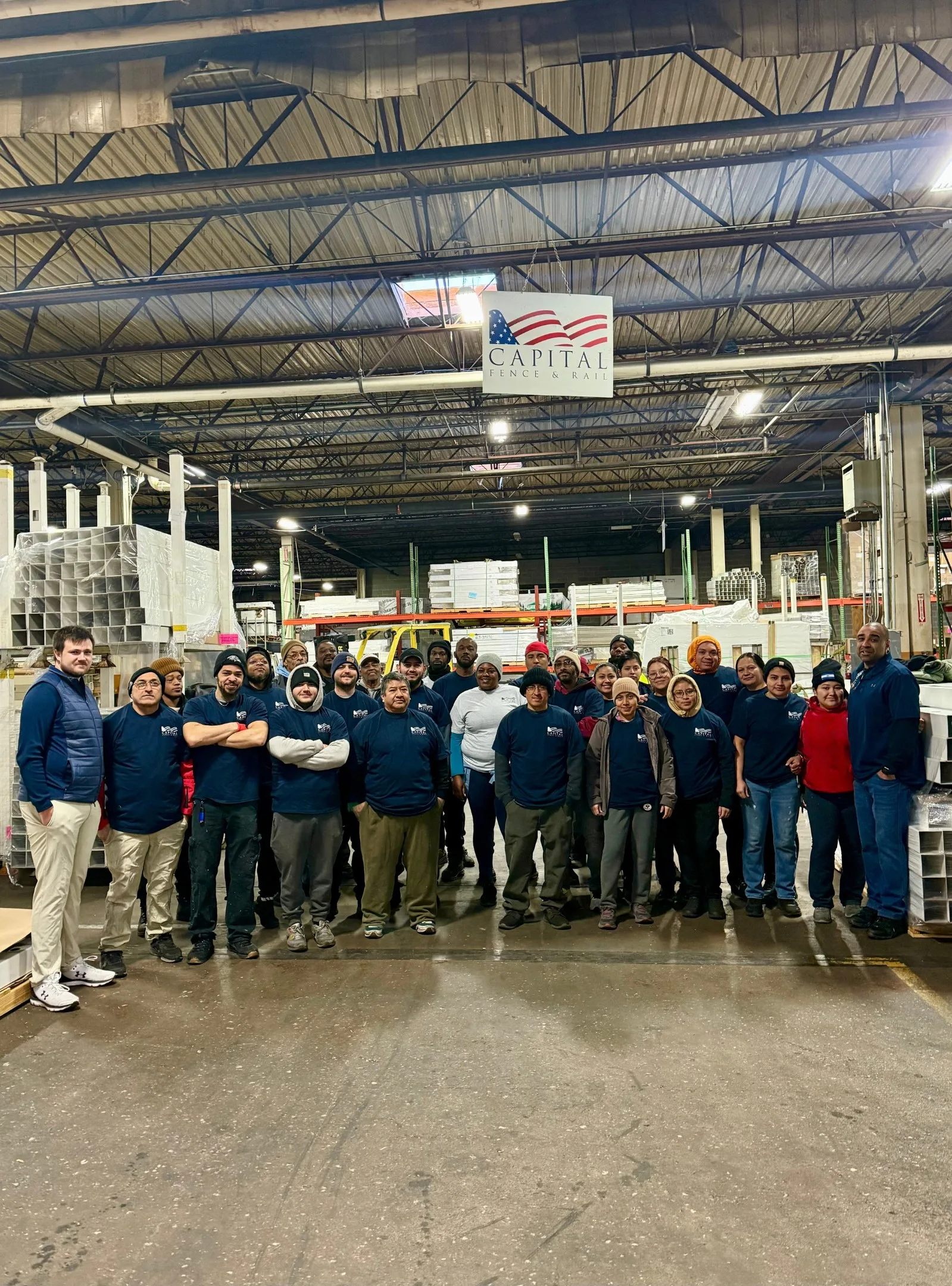 Capital Fence & Rail Richmond team inside the warehouse